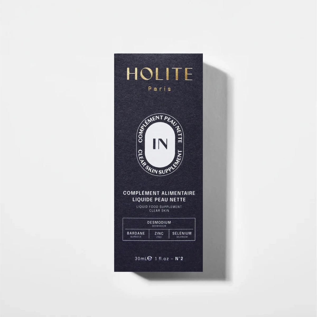Boîte Holite Paris IN Peau Nette - Packaging complément alimentaire liquide peau nette 30ml - Ingrédients : Desmodium, Bardane, Zinc, Sélénium - Liquid Food Supplement Clear Skin - Fabriqué en France