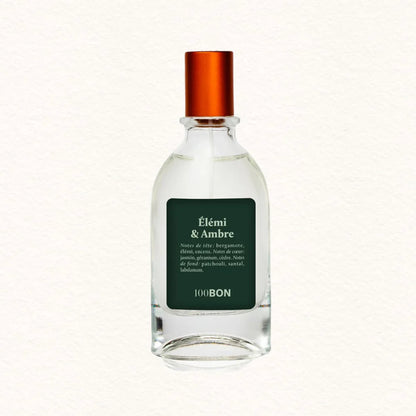 Flacon en verre de l'eau de cologne intense 100BON Élémi & Ambre, bouchon orange et étiquette verte
