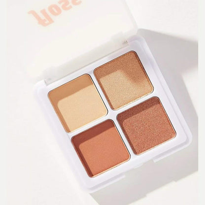 Palette de fards à paupières Floss Beauty Eyeshadow Squad ouverte – 4 teintes nude terracotta mates et shimmer dorées sur fond blanc